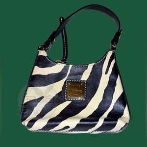 Dooney & Bourke Zebra-Print Bitsy mini Bag. Black and light tan
